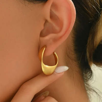 Boucles d oreilles torsade es dore es acier inoxydable 01