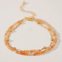 Bracelet 2 rangs perles orange et dore 