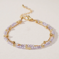 Bracelet 2 rangs perles violet et dore 